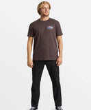 A man wearing a Billabong range short-sleeved t-shirt in a solid color, with a logo on the chest.