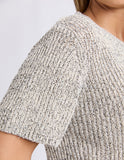 Close-up of a textured silver top on a plain background Foxwood Davana Knit - Oat Marle