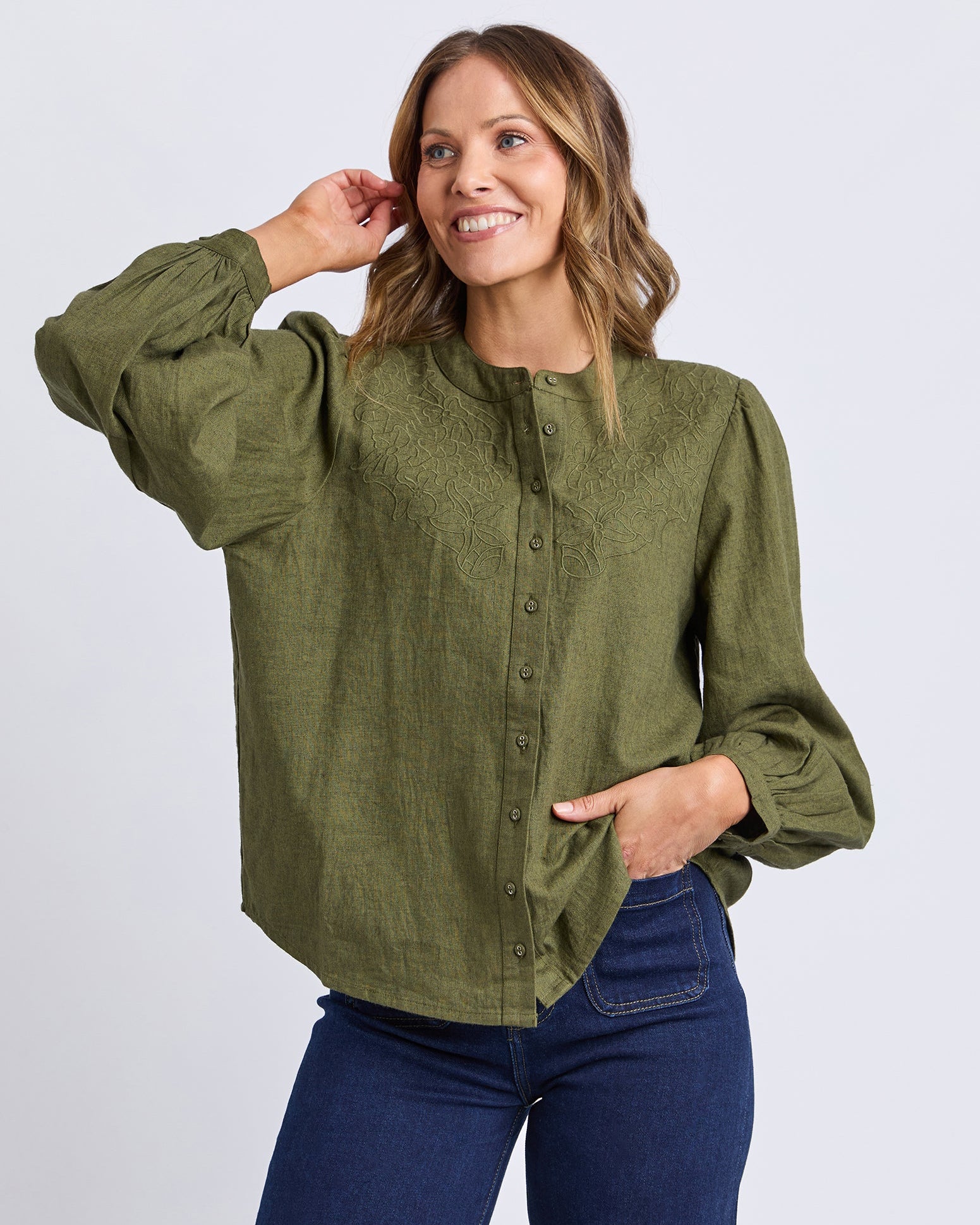 Woman wearing a green blouse with long sleeves on a white background Foxwood Eleanor Top - Winter Moss
