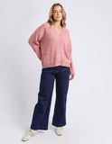 Woman wearing a pink cardigan and blue jeans on a white background Foxwood Emarie Cardi - Woodrose