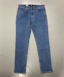 Pair of blue jeans on a gray textured surface Mens Lee L-Two Espy Stone Jeans