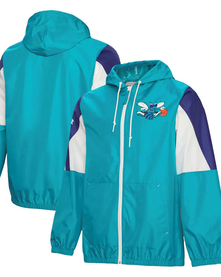 Teal and purple jacket with a cartoon character on a white background