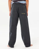 Boy wearing Rip Curl Hyped Canvas Boys Pants - Washed Black with a Rip Curl brand logo on a white background