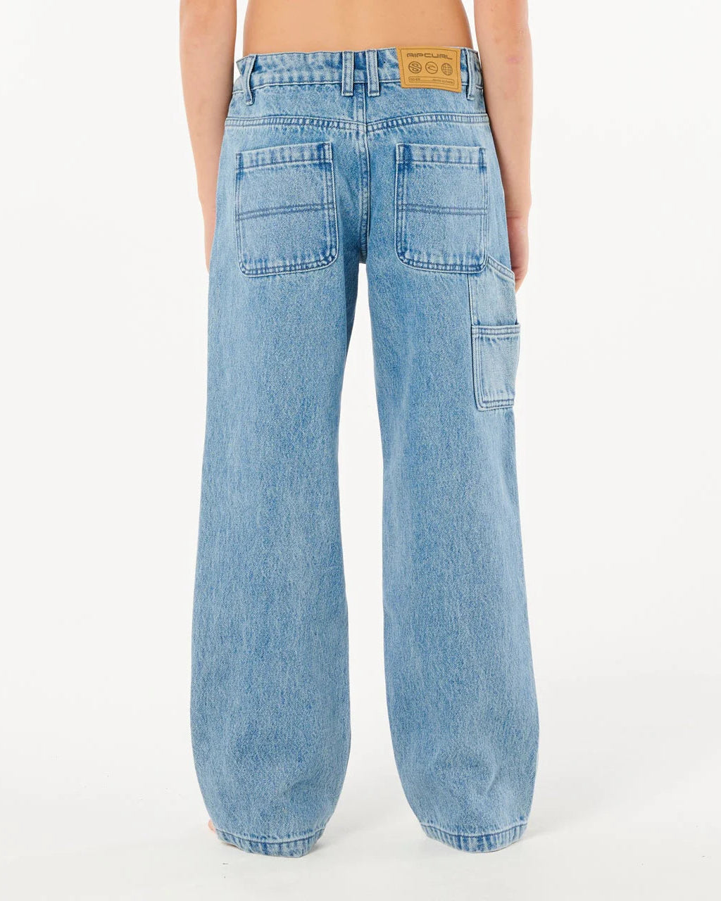 Light blue jeans worn by a person on a white background