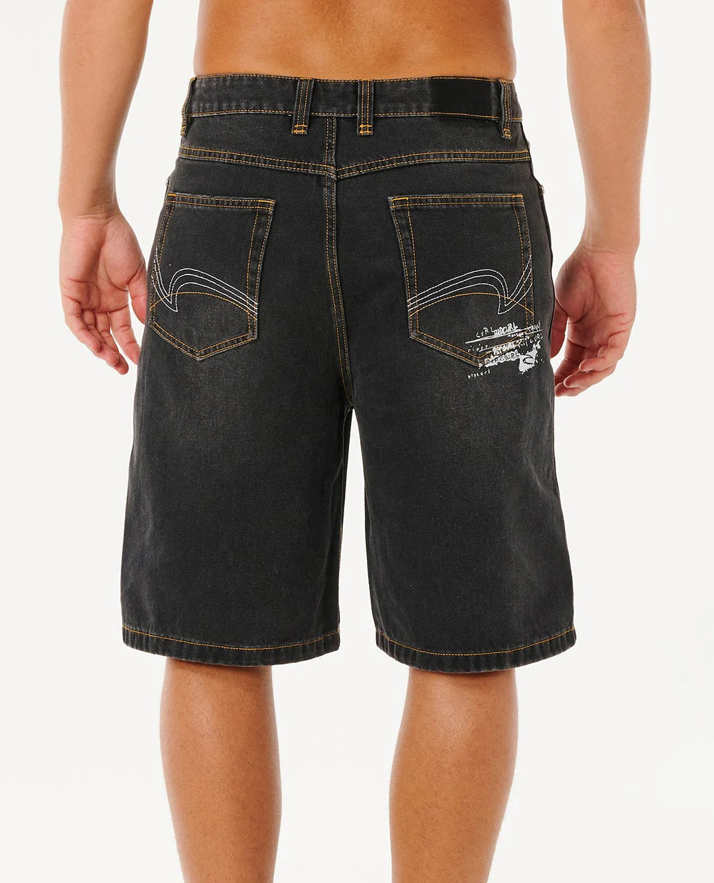 Black denim shorts worn by a person on a white background