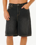 Black denim shorts worn by a person on a white background