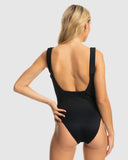 Woman wearing a black swimsuit on a light gray background Roxy Rib Roxy Love The Spinner One Piece - Anthtacite
