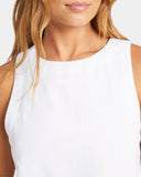 White sleeveless top worn by a person with a blurred background Roxy Womens Amor Tank Top - White