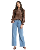 Seeking Lola Harper Top in Pink Polka dot print blouse, sold by Point Break Cambridge local family surf shop at 63 Duke street.