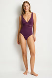 Front view of the Sea Level Essentials Edit Spliced one piece swimsuit in Claret red showing the flattering panel lines.