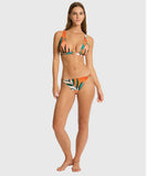 Woman wearing a colorful bikini with a white background Sea Level Tropaluxe Chain Link Bikini Pant - Khaki