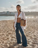 Sea Level Denim Surf Tide Pant in denim blue front view displayed at Point Break Cambridge, a local family surf shop.