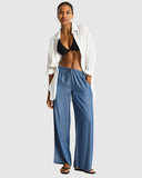 Sea Level Denim Surf Tide Pant in denim blue front view displayed at Point Break Cambridge, a local family surf shop.