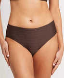 A close-up of a model wearing high-waisted ribbed bikini bottoms in a dark brown color, showing the texture of the fabric.