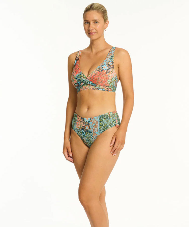 Woman wearing a colorful bikini set on a white background Sea Level Java Mid Drawstring Pant - Coral