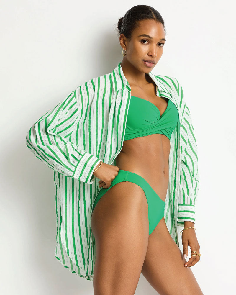 Woman wearing a green bikini with a matching cover-up against a white background Sea Level Vacay Cruise Shirt - Kelly Green