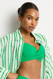 Woman wearing a green bikini and green and white striped shirt against a plain background Sea Level Vacay Cruise Shirt - Kelly Green