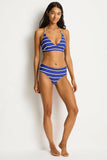 Woman wearing a blue and white striped bikini on a white background Sea Level Voyage Mid Bikini Pant - Amalfi Blue