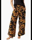 Woman wearing the Seeking Lola Every Day Love Pants - Burnt Sienna