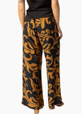 Woman wearing the Seeking Lola Every Day Love Pants - Burnt Sienna