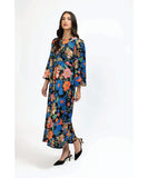Woman wearing a colorful floral dress on a white background Seeking Lola Elegant Dress - Fantasia