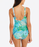 Woman wearing a floral-patterned swimsuit on a white background