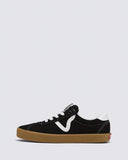 Vans Sport Low Black/Gum Black and white sneaker with a brown sole on a light gray background