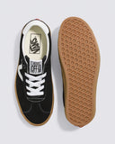 Vans Sport Low Black/Gum Black sneaker with white laces and tan sole on a light gray background