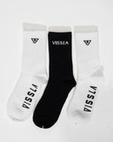 Three socks with 'VISSLA' branding on a white background