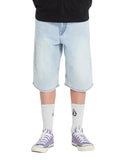 Person wearing light blue denim shorts, white socks, and purple sneakers on a white background