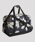 Floral patterned duffel bag with black straps on a light gray background Volcom Patch Attack Gearbag - Black with white flowers 