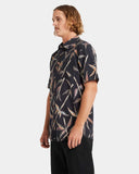 Man wearing a dark patterned shirt on a white background Volcom Scaler Stone Woven SS Shirt - Vintage Black