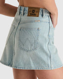 Light blue denim skirt with Wrangler logo on a white background