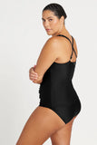 Side view of the black Artesands Raphael tankini top highlighting adjustable wide straps in their criss cross formation and upper back scoop line.