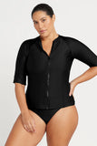 Front view of the Artesands Hues Sun Safe short sleeve zip front rash top in black showing the full-length central zipper.