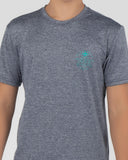Gray t-shirt with a small blue graphic on a plain background