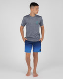Front view of the Billabong boys Wavy Davy loose fit short sleeve rash shirt in Navy Heather showing the chest branding.