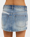 Billabong Dream On Skirt in Ocean Wash blue close up view highlighting the premium soft cotton denim fabric weave texture custom branded hardware and detailed vintage indigo dye finishing, sold by Point Break Cambridge local family surf shop at 63 Duke street.