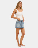 Billabong Dream On Skirt in Ocean Wash blue side profile view highlighting the comfortable mid rise height clean outseam stitching paneling and functional deep pocket entry lines, sold by Point Break Cambridge local family surf shop at 63 Duke street.