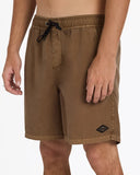 Billabong Mens All Day Overdyed Layback 17 inch Boardshorts in Coffee Bean brown side profile view highlighting the modern 17 outseam hemline and comfortable relaxed leg opening architecture, sold by Point Break Cambridge local family surf shop at 63 Duke street.