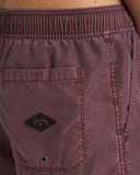 Billabong Mens All Day Overdyed Layback 17 inch Boardshorts in Port burgundy wine close up view highlighting the premium water resistant overdyed fabric texture branded drawcord tips and secure pocket drainage eyelet detail, sold by Point Break Cambridge local family surf shop at 63 Duke street.