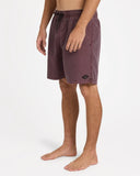 Billabong Mens All Day Overdyed Layback 17 inch Boardshorts in Port burgundy wine side profile view highlighting the modern 17 outseam hemline and comfortable relaxed leg opening architecture, sold by Point Break Cambridge local family surf shop at 63 Duke street.