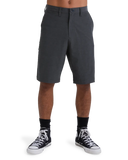 Billabong Mens Crossfire Hybrid Walkshorts in Asphalt front view showcasing the versatile charcoal-grey colourway classic chino-inspired silhouette fixed waistband button and zip fly closure four-way stretch fabric and practical side entry pockets, sold by Point Break Cambridge local family surf shop at 63 Duke Street.