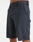 Billabong Mens Crossfire Hybrid Walkshorts in Black side profile view highlighting the modern active outseam hemline length and comfortable relaxed leg opening architecture, sold by Point Break Cambridge local family surf shop at 63 Duke street.