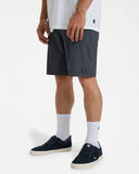 Billabong Mens Crossfire Hybrid Walkshorts in Black side profile view highlighting the modern active outseam hemline length and comfortable relaxed leg opening architecture, sold by Point Break Cambridge local family surf shop at 63 Duke street.
