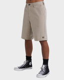 Billabong Mens Crossfire Hybrid Walkshorts in Khaki sand side profile view highlighting the modern active outseam hemline length and comfortable relaxed leg opening architecture, sold by Point Break Cambridge local family surf shop at 63 Duke street.