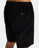 Billabong Mens Larry Corduroy Walkshorts in Char close up view highlighting the premium 8-wale cotton corduroy ribbed texture, adjustable waistband drawcord, detailed stitching, soft fabric finish and signature Billabong woven branding, sold by Point Break Cambridge local family surf shop at 63 Duke Street.