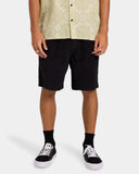 Billabong Mens Larry Corduroy Walkshorts in Char front view showcasing the relaxed 18-inch silhouette, premium cotton corduroy texture, comfortable elasticated drawcord waistband, practical side entry pockets and versatile charcoal-grey colourway, sold by Point Break Cambridge local family surf shop at 63 Duke Street.