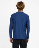 Billabong Mens Shoreline UPF 50 Long Sleeve Rashguard in Denim Heather blue back view showing the relaxed straight silhouette drape and premium protective flatlock structural seam stitching layouts, sold by Point Break Cambridge local family surf shop at 63 Duke street.