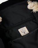 Billabong Pacific Beach Bag in Black close up view highlighting the premium textured woven fabric weave pattern secure internal zipper pocket lining and detailed brand badge hardware, sold by Point Break Cambridge local family surf shop at 63 Duke street.